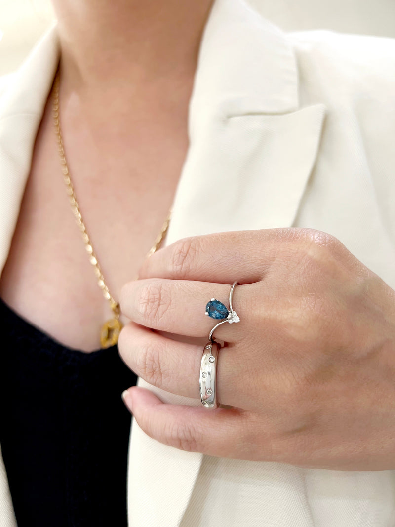 Pear Topaz and Diamond Accent Ring