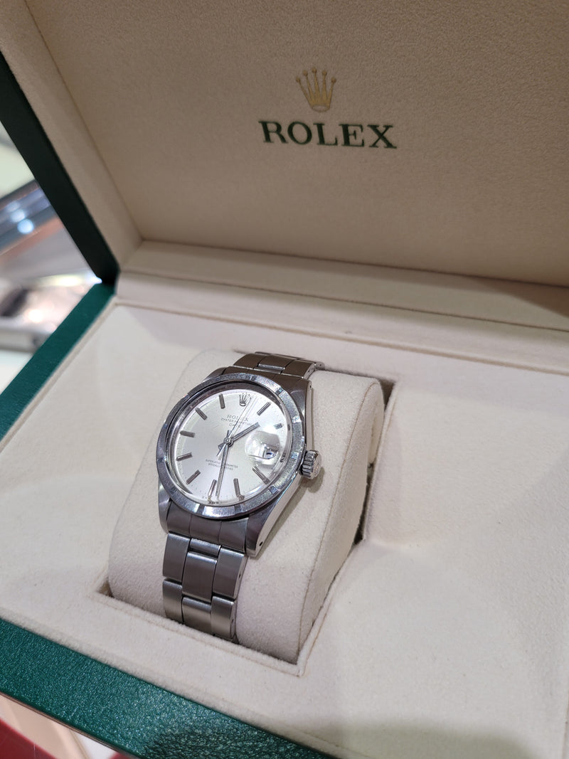 ROLEX - Oyster Perpetual Date Engine Turned Bezel 34mm