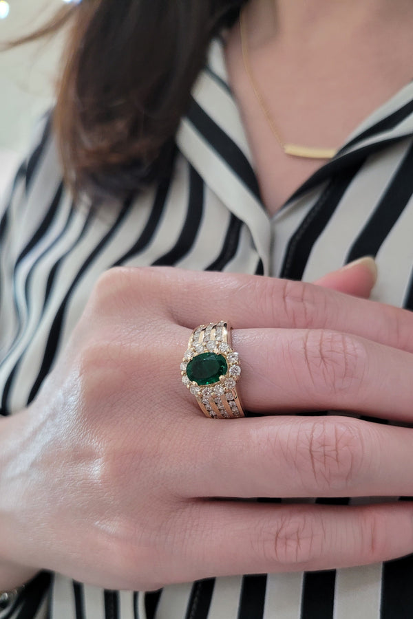 Oval Emerald and Diamond Halo Ring